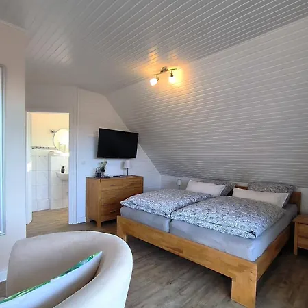 Quarto em Acomodações Particulares Gaestehaus Schuppe In *